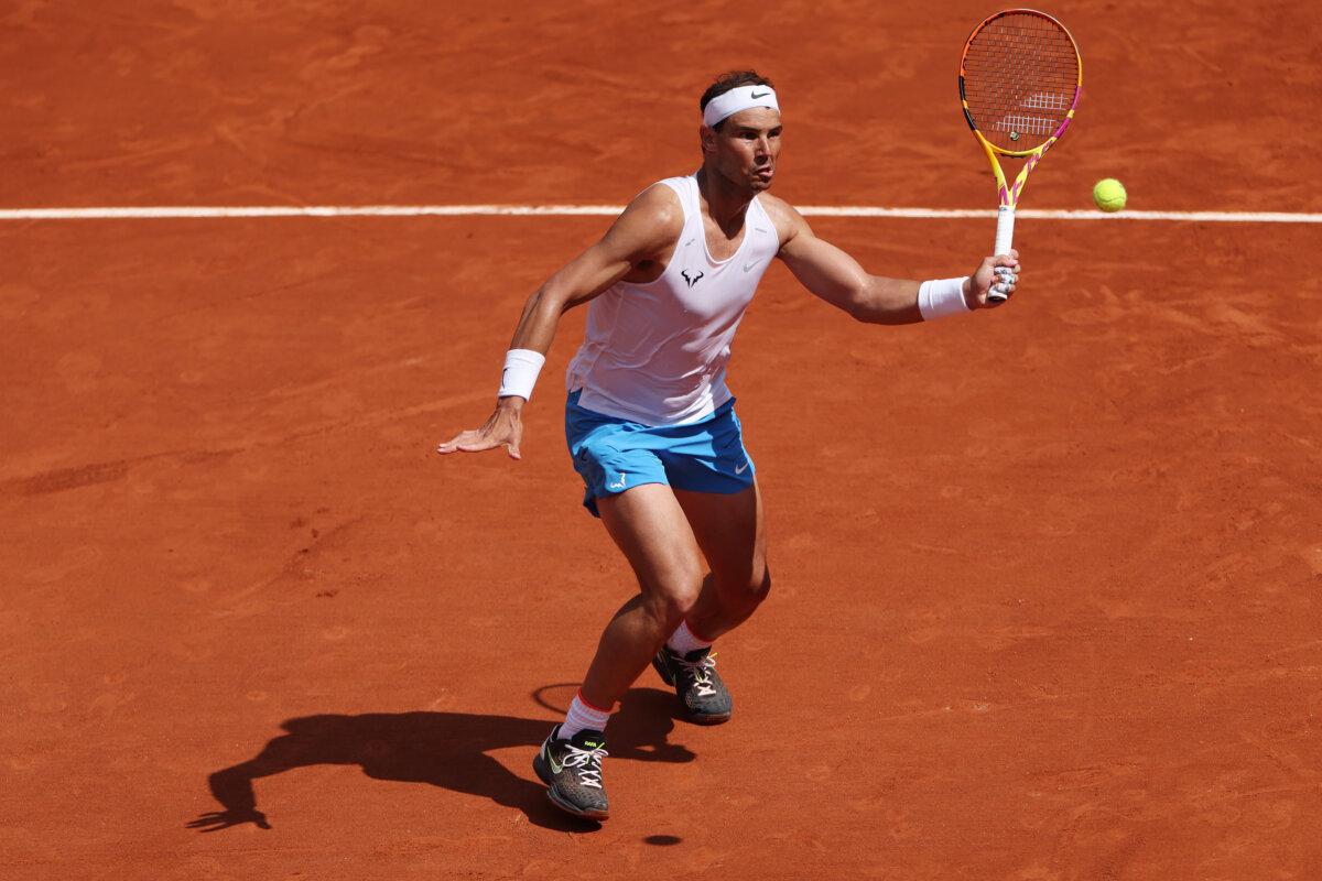 Rafael Nadal of Spain plays a forehand to Holger Rune of Denmark during a practice session during previews for the 2024 French Open at Roland Garros in Paris, France on May 25, 2024. (Dan Istitene/Getty Images)