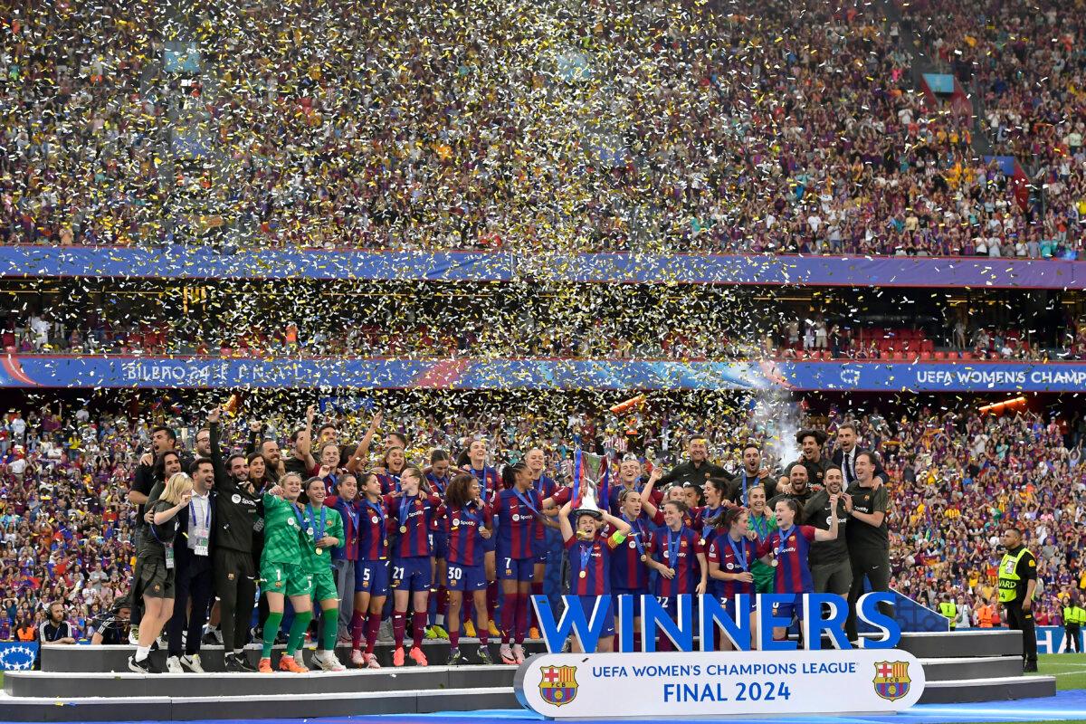 Barcelona's team captain Alexia Putellas lifts the trophy after winning the women's Champions League final soccer match between FC Barcelona and Olympique Lyonnais at the San Mames stadium in Bilbao, Spain, on May 25, 2024. (Alvaro Barrientos/AP Photo)
