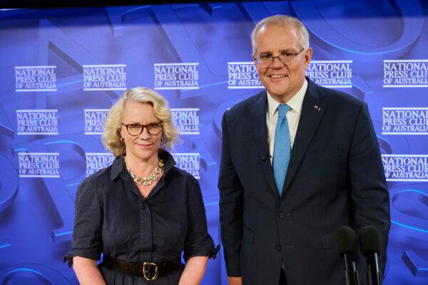 Former Prime Minister Scott Morrison with National Press Club President Laura Tingle in Canberra, Australia, on Feb. 1, 2022. (Rohan Thomson/Getty Images)