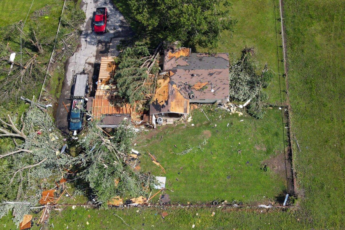 A home damaged by a storm the night before, in Pryor, Okla., on May 26, 2024. (Mike Simons/Tulsa World via AP)