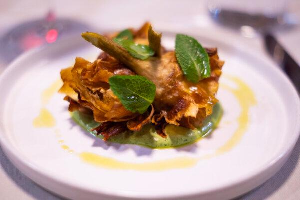 Starting off right at CERVO's Madre Nostra with fried artichokes topped with mint and a salsa verde base. (Benjamin Myers/TNS)