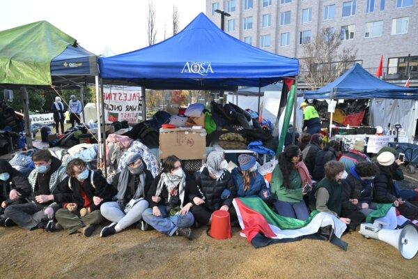 Students barricade the Gaza Solidarity encampment on the campus of the Australian National University (ANU) in Canberra, Australia, on May 27, 2024. (AAP Image/Mick Tsikas)