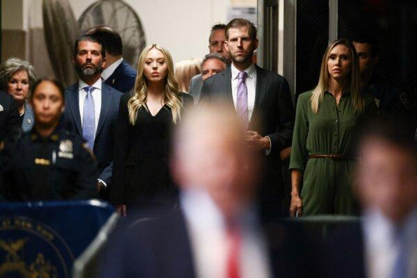 (L-R) Donald Trump Jr., Tiffany Trump, Eric Trump, and Lara Trump listen to former President Donald Trump speak to the media at Manhattan Criminal Court in New York City, on May 28, 2024. (Andrew Kelly / POOL / AFP)