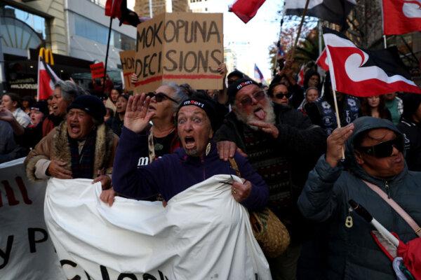 Protestors march down Queen Street in the Auckland CBD ahead of the Budget release, protesting the Government's policies for Maori in Auckland, New Zealand, on May 30, 2024. (Phil Walter/Getty Images)