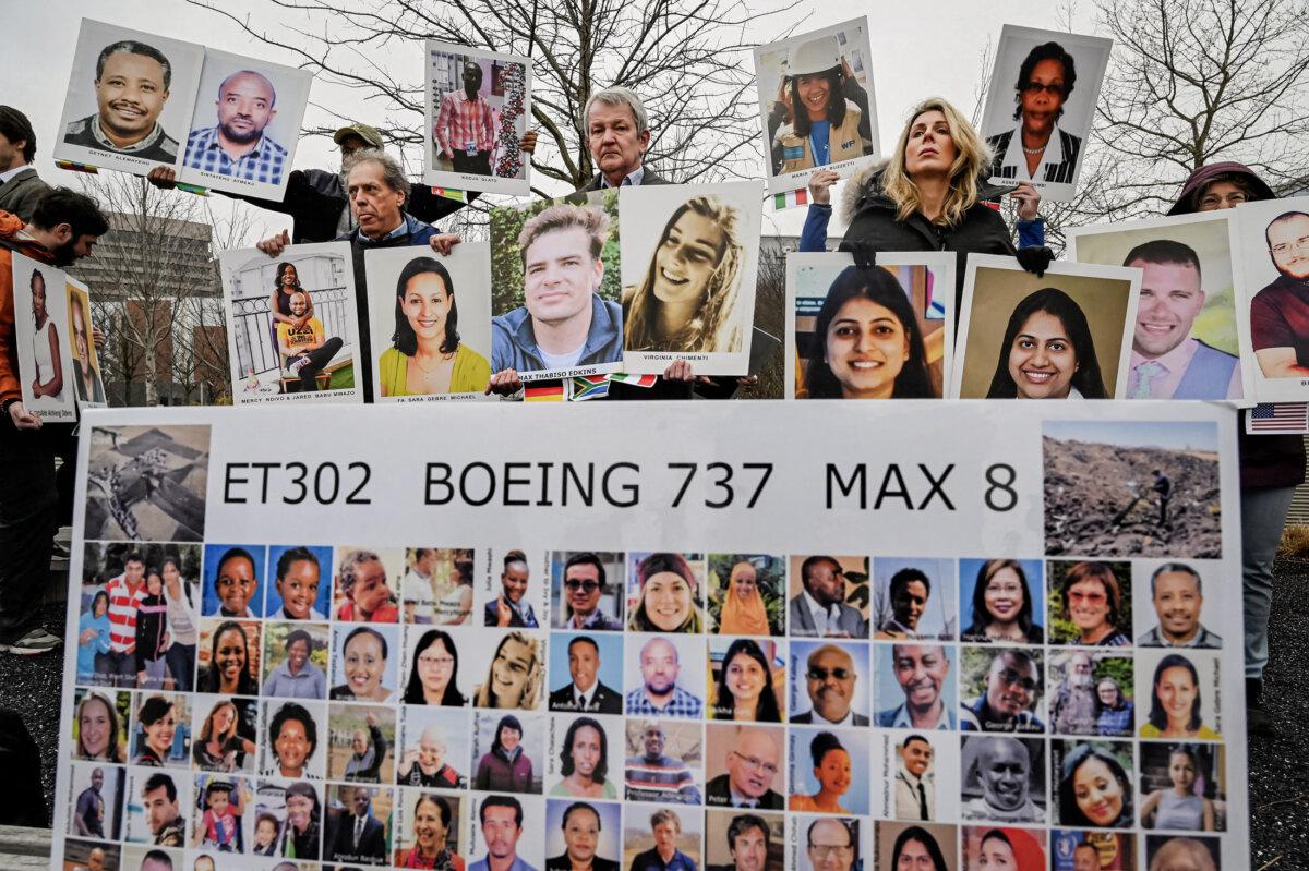 Families and friends who lost loved ones in the March 10, 2019, Boeing 737 Max crash in Ethiopia hold a protest in front of the Boeing headquarters in Arlington, Va., on March 10, 2023. (Olivier Douliery/AFP via Getty Images)