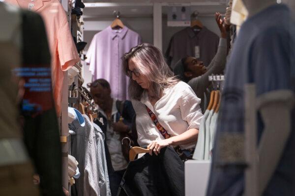 People shop at a clothing store in Washington, on May 29, 2024. (Madalina Vasiliu/The Epoch Times)