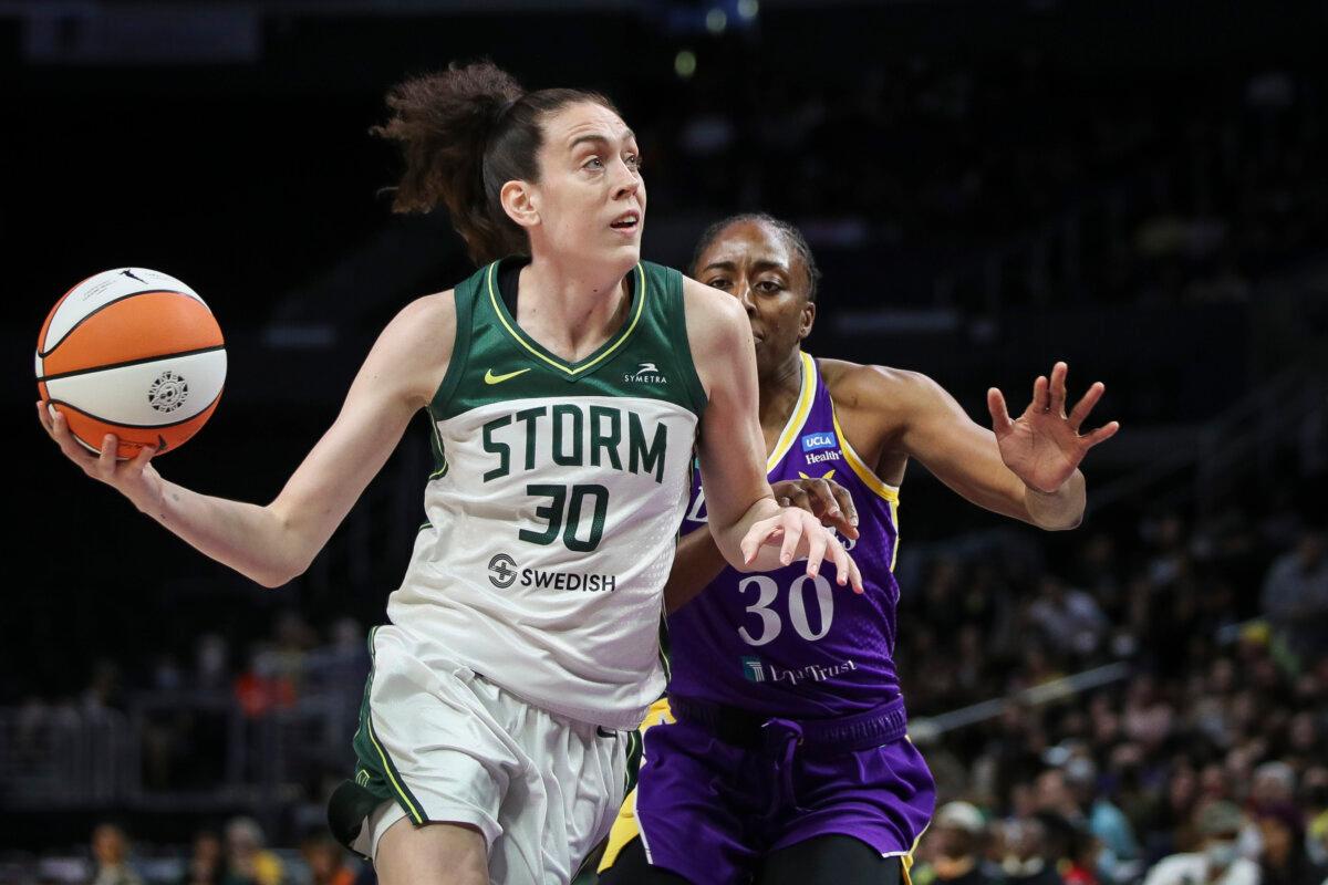 Breanna Stewart #30 of the Seattle Storm handles the ball in the first half ahead of Nneka Ogwumike #30 of the Los Angeles Sparks at Crypto.com Arena on July 07, 2022 in Los Angeles, California. (Meg Oliphant/Getty Images)