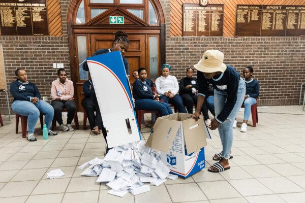 Electoral Commission of South Africa officials empty a ballot box during the vote counting process at Addington Primary School voting station during South Africa's general election in Durban, South Africa, on May 29, 2024. (Rajesh Jantilal/AFP via Getty Images)