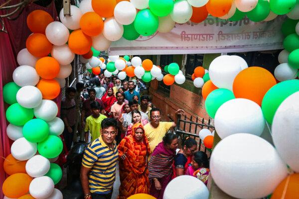 Voters queue up to cast their ballots at a polling station during the seventh and final phase of voting in India's general election in Varanasi on June 1, 2024. (Niharika Kulkarni/AFP via Getty Images)