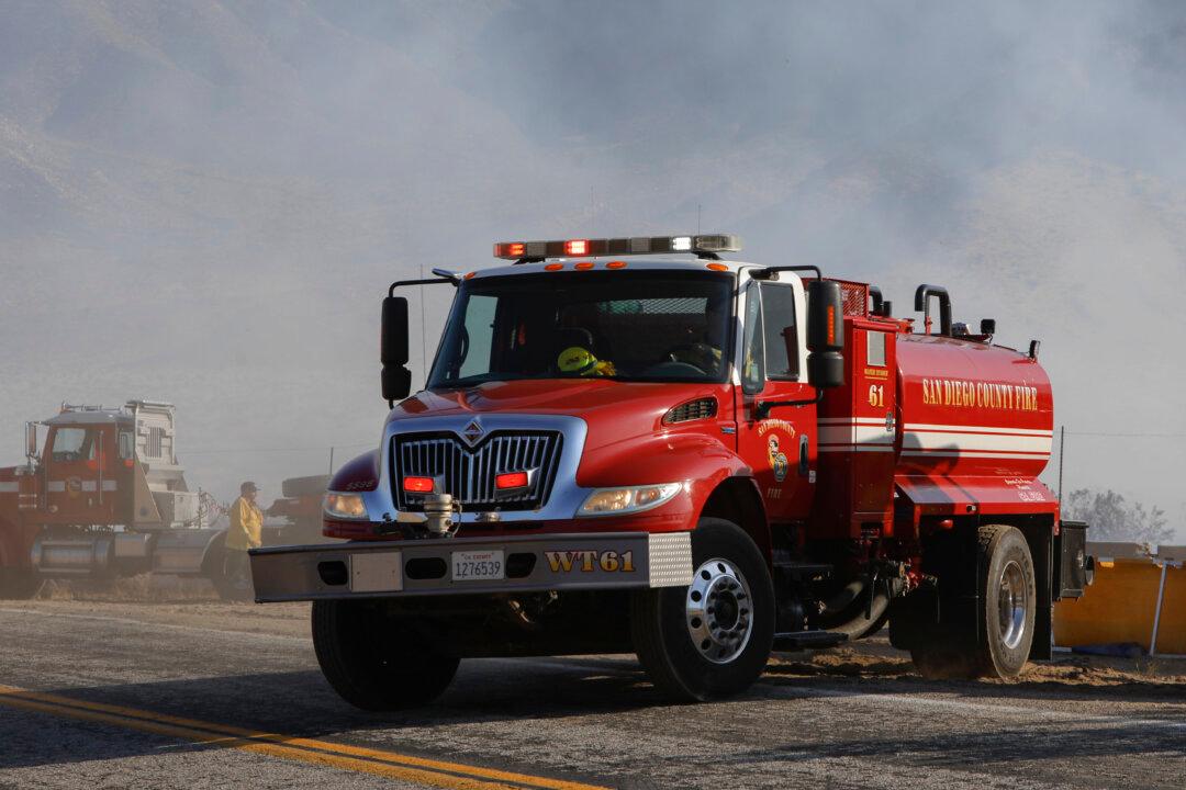 Firefighters Battle Large Wildfire Across US-Mexico Border