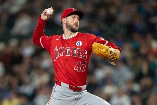 Starter Griffin Canning (47) of the Los Angeles Angels delivers a pitch during the first inning of a game against the Seattle Mariners in Seattle on June 2, 2024. (Stephen Brashear/Getty Images)