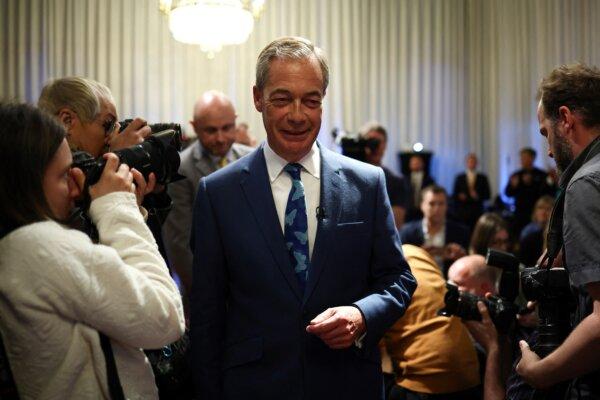 Reform UK leader and MP Nigel Farage arrives for a campaign meeting in London, on June 3, 2024. (Henry Nicholls/AFP via Getty Images)