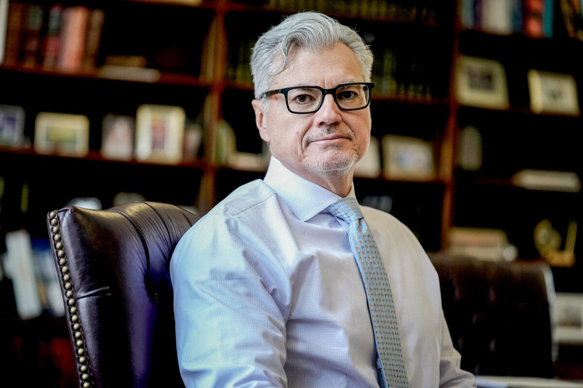Justice Juan Merchan poses in his chambers in New York City on March 14, 2024. (Seth Wenig/AP Photo)