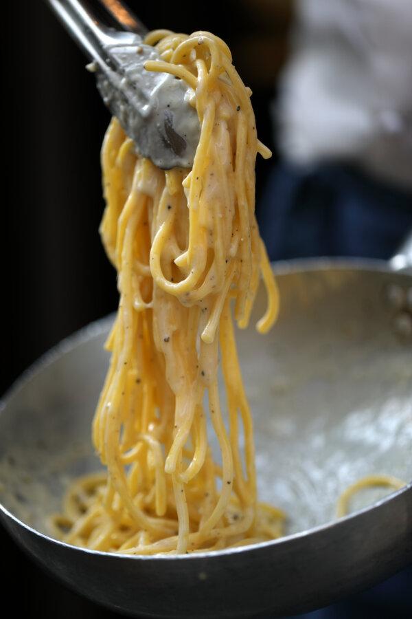 The starchy pasta cooking water helps thicken and emulsify your cheese sauce for rich, creamy results. (Cavan-Images/Shutterstock)
