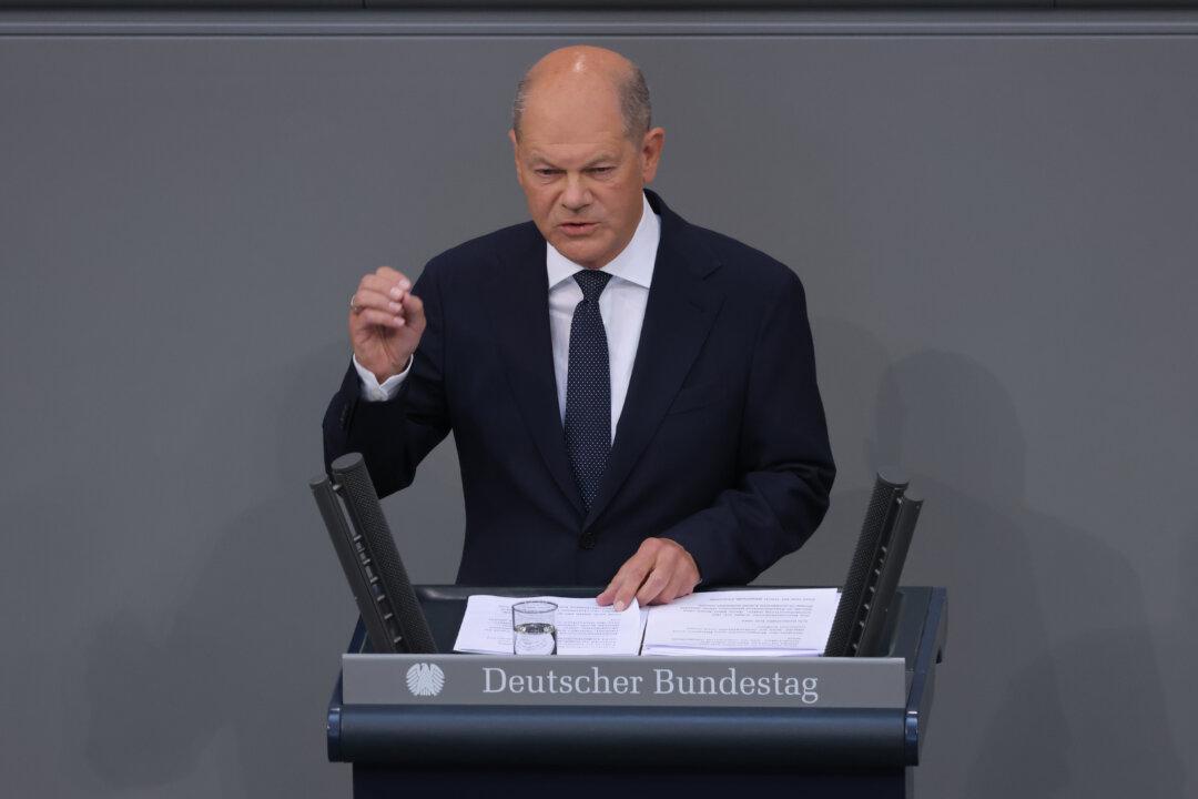 German Chancellor Vows to Deport Immigrants Convicted of Crimes After Fatal Knife Attack