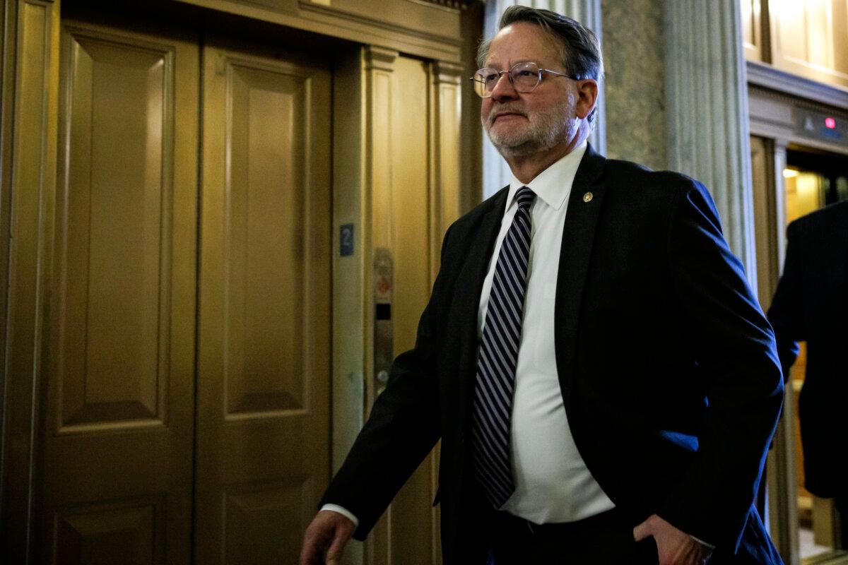 Sen. Gary Peters (D-Mich.) heads to the floor of the Senate for a vote on Capitol Hill in Washington on Feb. 11, 2024. (Samuel Corum/Getty Images)