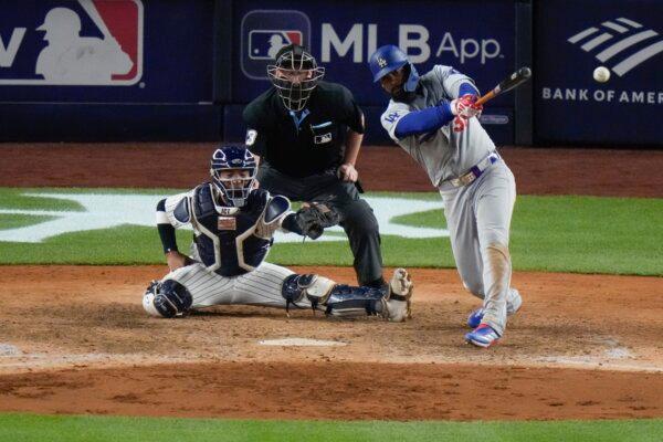Los Angeles Dodgers' Teoscar Hernández (37) hits a two-run double during the eleventh inning of a baseball game against the New York Yankees in New York on June 7, 2024. (Frank Franklin II/AP Photo)