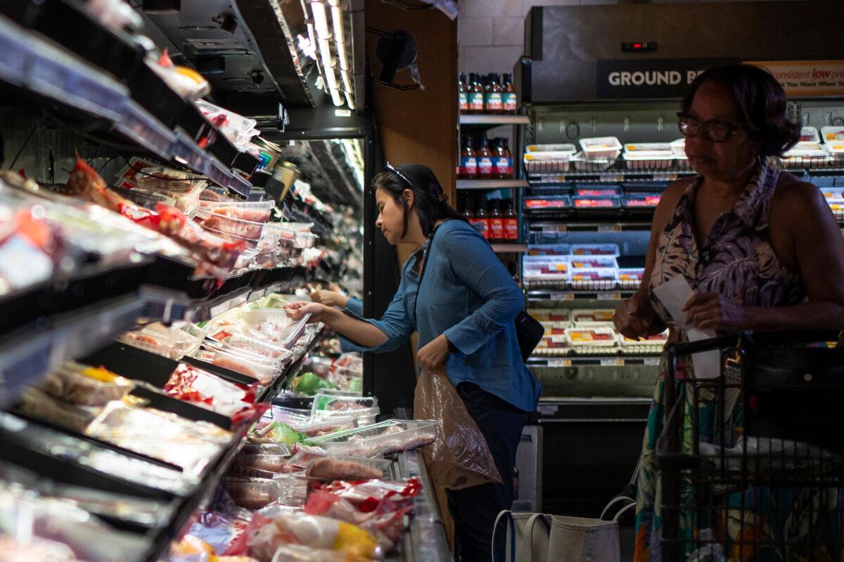 People shop at a grocery store in Columbia, Md., on June 8, 2024. (Madalina Vasiliu/The Epoch Times)