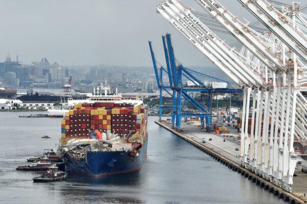 The damaged container ship Dali is maneuvered into the Seagirt Marine Terminal in Baltimore, on May 20, 2024. (Chip Somodevilla/Getty Images)