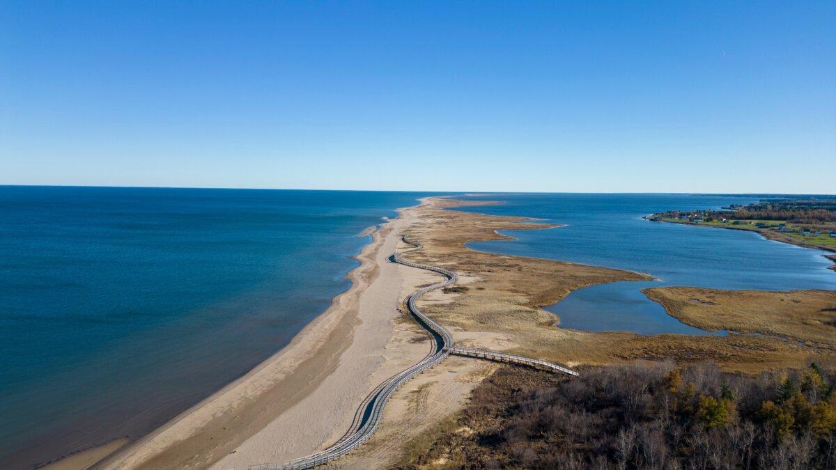 An aerial view of the wooden boardwalk overlooking the La Dune de Bouctouche sand dunes in New Brunswick. (Shutterstock/Windmills Media)