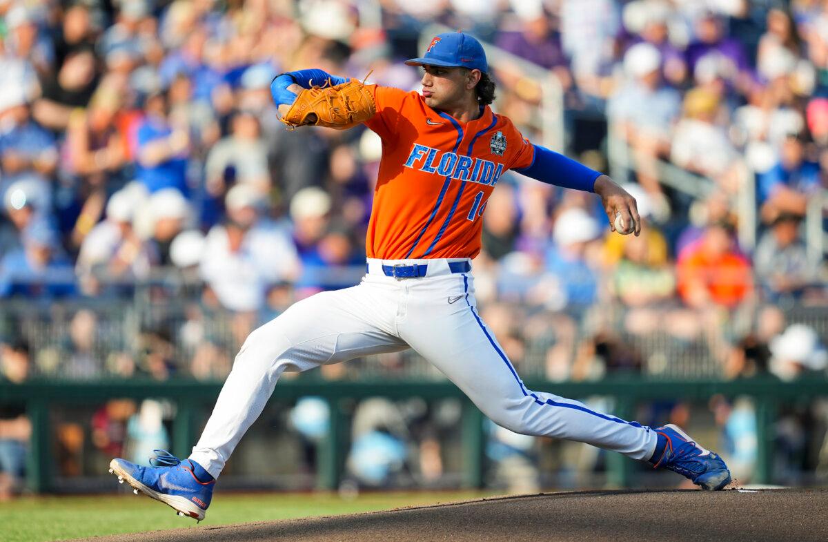 Jac Caglianone, #14 of the Florida Gators, pitches against the LSU Tigers during Game 3 of the NCAA College World Series baseball finals at Charles Schwab Field in Omaha, Neb., on June 26, 2023. (Biggerstaff/Getty Images)