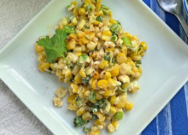 Elote, or Mexican street corn, is made savory with feta, mayonnaise and a sprinkle of smoked paprika. (Gretchen McKay/Pittsburgh Post-Gazette/TNS)