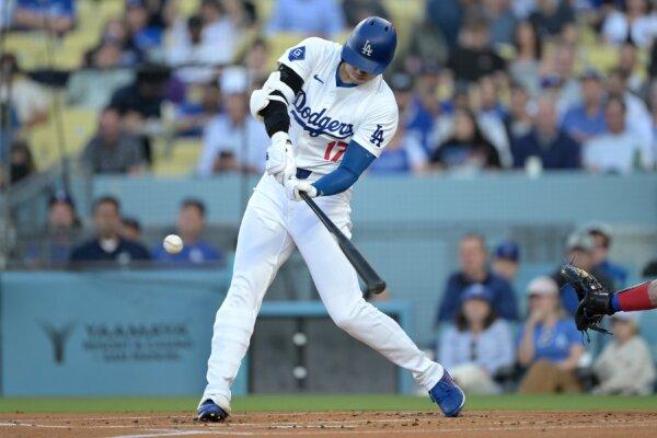 Shohei Ohtani (17) of the Los Angeles Dodgers hits a solo home run in the first inning against the Texas Rangers in Los Angeles on June 12, 2024. (Jayne Kamin-Oncea/Getty Images)