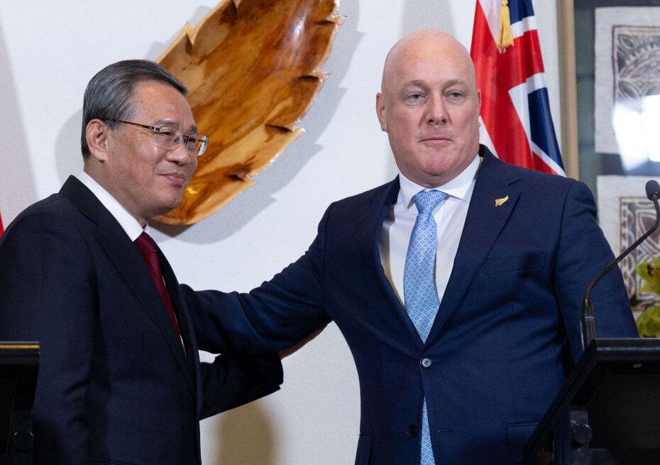 CCP Premier Li Qiang (L) and New Zealand's Prime Minister Christopher Luxon pose after attending a joint press conference at Government House in Wellington, New Zealand on June 13, 2024. (Marty Melville/AFP via Getty Images)