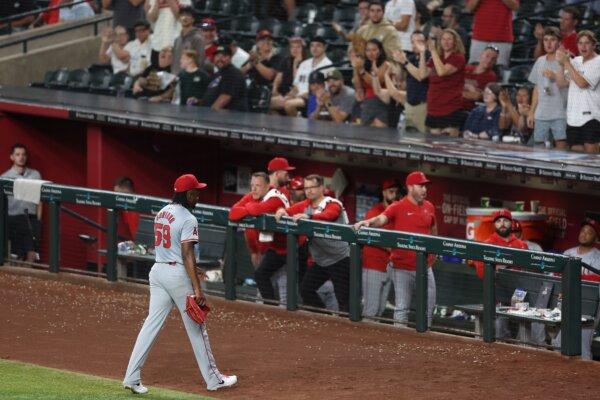 Fans cheer as starting pitcher José Soriano (59) of the Los Angeles Angels walks to the dugout after being relieved during the ninth inning of the MLB game against the Arizona Diamondbacks in Phoenix on June 12, 2024. (Christian Petersen/Getty Images)