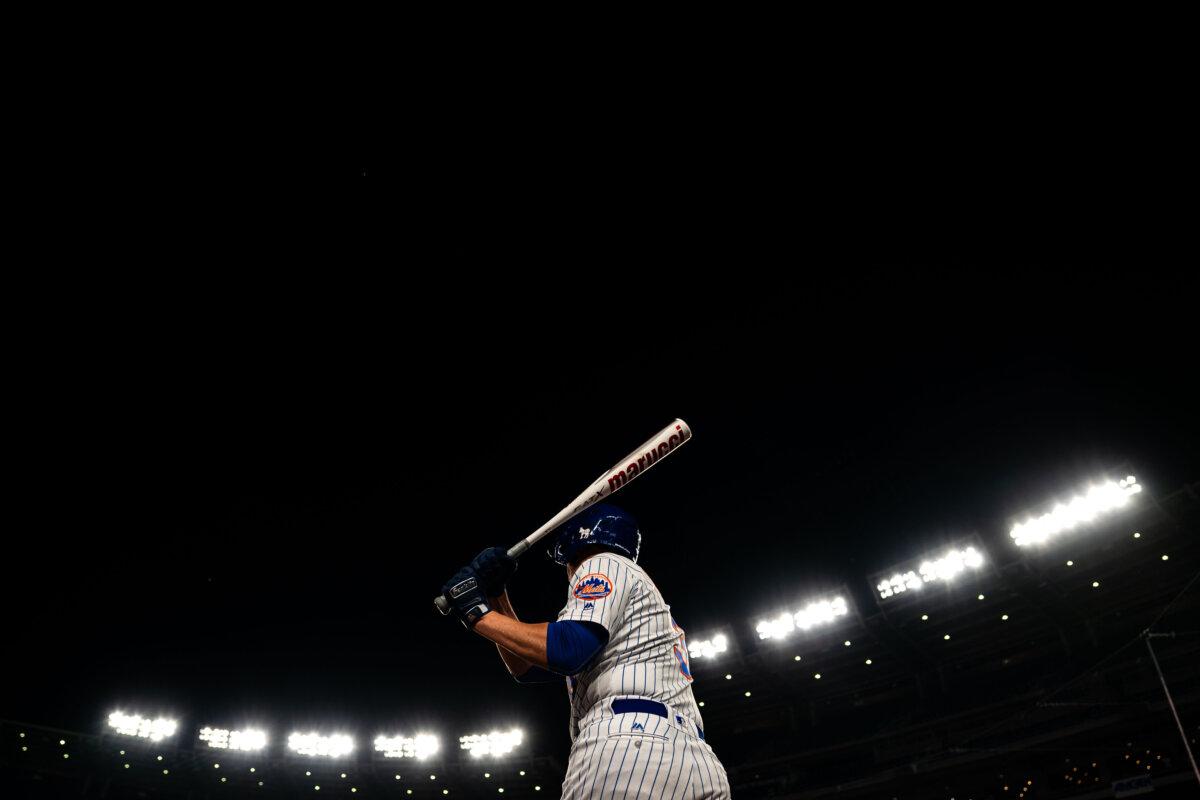 Rep. Tom Suozzi (D-N.Y.) takes practice swings before his bat during the Congressional Baseball Game for Charity at Nationals Park on June 12, 2024, in Washington. (Kent Nishimura/Getty Images)