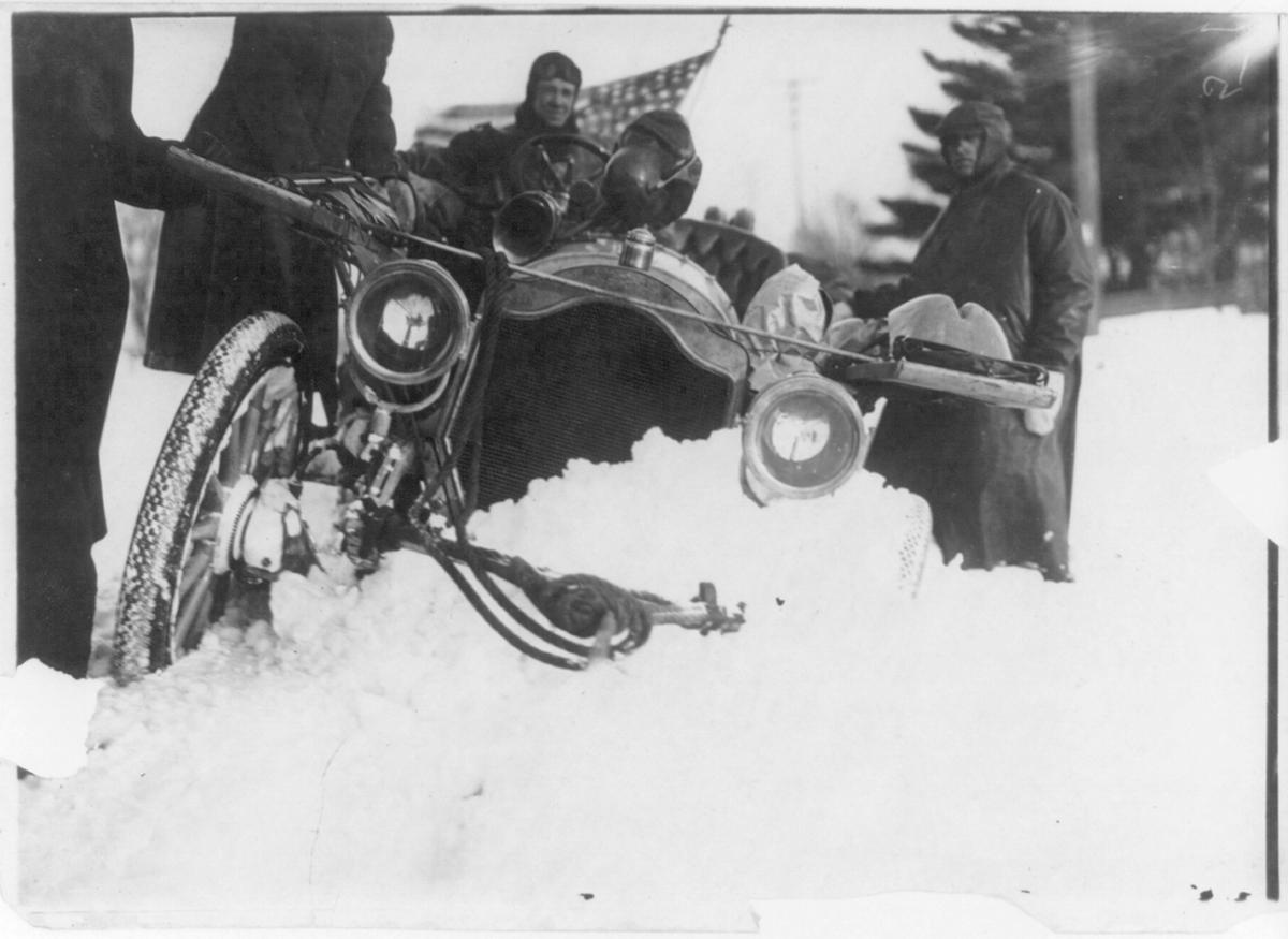 An automobile stuck in the New York blizzard snow. Library of Congress. (Public Domain)