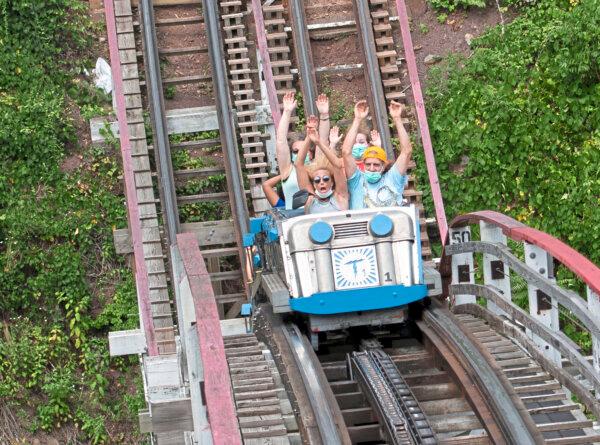 Kennywood guests react as they ride the Thunderbolt on National Roller Coaster Day on Sunday, Aug. 16, 2020, at Kennywood in West Mifflin, Pennsylvania. (Emily Matthews/Pittsburgh Post-Gazette/TNS)