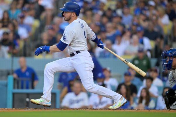 Gavin Lux (9) of the Los Angeles Dodgers singles in two runs in the fourth inning against the Kansas City Royals in Los Angeles on June 15, 2024. (Jayne Kamin-Oncea/Getty Images)
