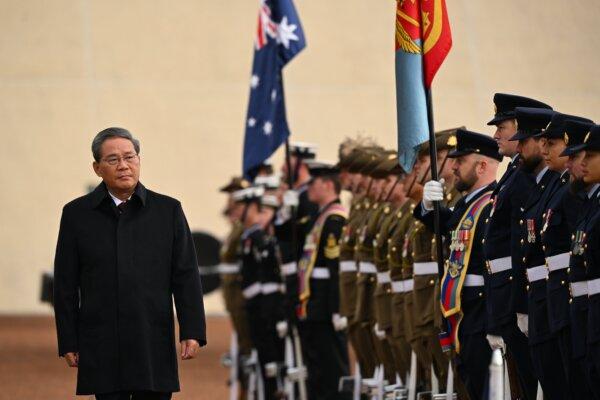 CCP Premier Li Qiang inspects a guard of honour outside the Australian Parliament House in Canberra, Australia on June 17, 2024. Li Qiang, who is second only to CCP leader Xi Jinping, is on a four-day visit to Australia. (AAP Image/Lukas Coch)
