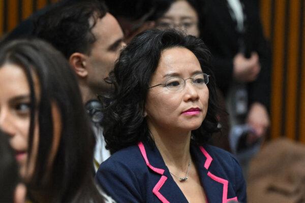 Australian journalist Cheng Lei observes a signing ceremony by China's Premier Li Qiang and Australia's Prime Minister Anthony Albanese at the Australian Parliament House in Canberra, Australia, on June 17, 2024. (Lukas Coch/POOL/AFP via Getty Images)