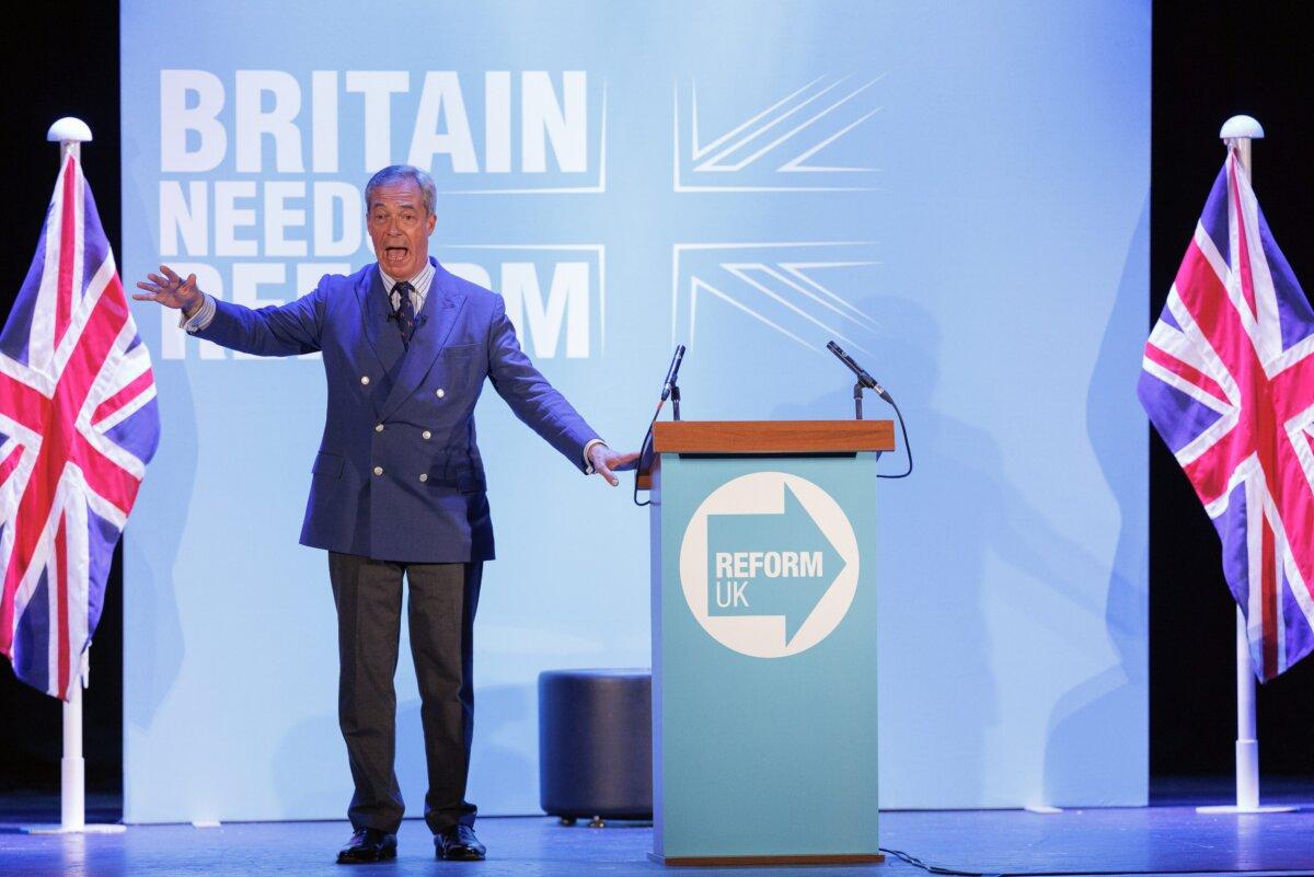 Reform UK leader Nigel Farage speaks to an audience on stage at Princes Theatre in Clacton-on-Sea, England, on June 18, 2024. (Dan Kitwood/Getty Images)