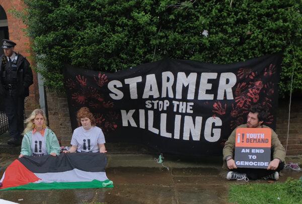 (L to R) Zosia Lewis, Leonorah Ward and Daniel Formentin protesting outside the home of Labour leader Sir Keir Starmer in London on April 9, 2024 (Youth Demand/PA Wire)