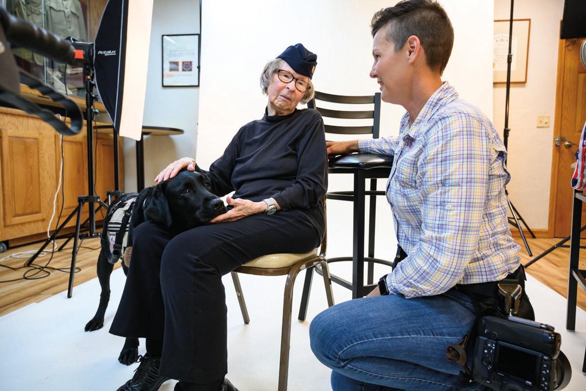 Ms. Pearsall speaks with WWII-era Coast Guard veteran Kathleen Donahue during a Veterans Portrait Project event held in Bismarck, N.D., July 2019. (Trish Barini)