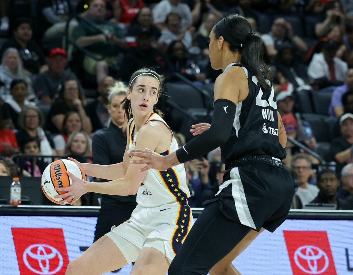 Caitlin Clark #22 of the Indiana Fever looks to pass against A'ja Wilson #22 of the Las Vegas Aces in the first quarter of their game at Michelob ULTRA Arena in Las Vegas, Nev., on May 25, 2024. (Ethan Miller/Getty Images)