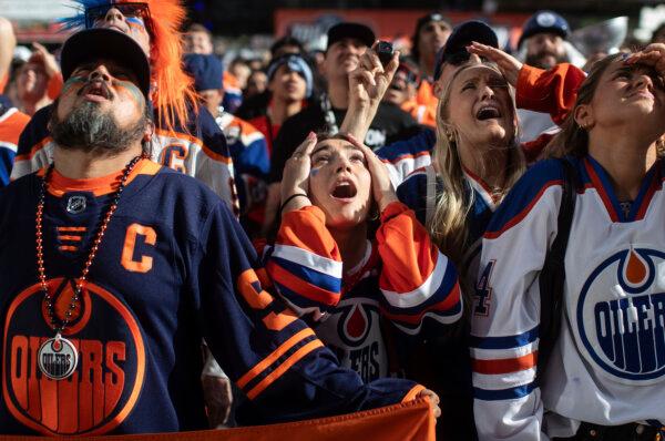 Edmonton Oilers fans react to a Florida Panthers goal as they watch Game 7 of the Stanley Cup Final from Edmonton on June 24, 2024. (Jason Franson/The Canadian Press via AP)