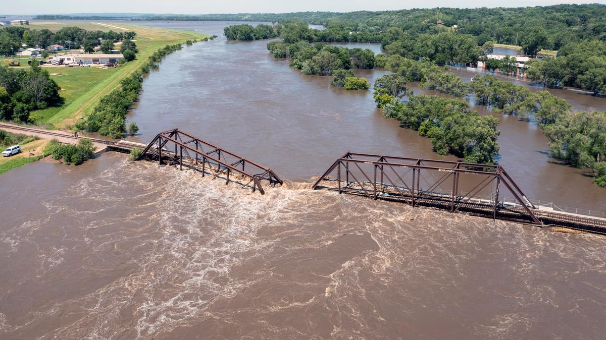 Midwestern Flooding Collapses Bridge, Forces Evacuations and Kills at Least 2