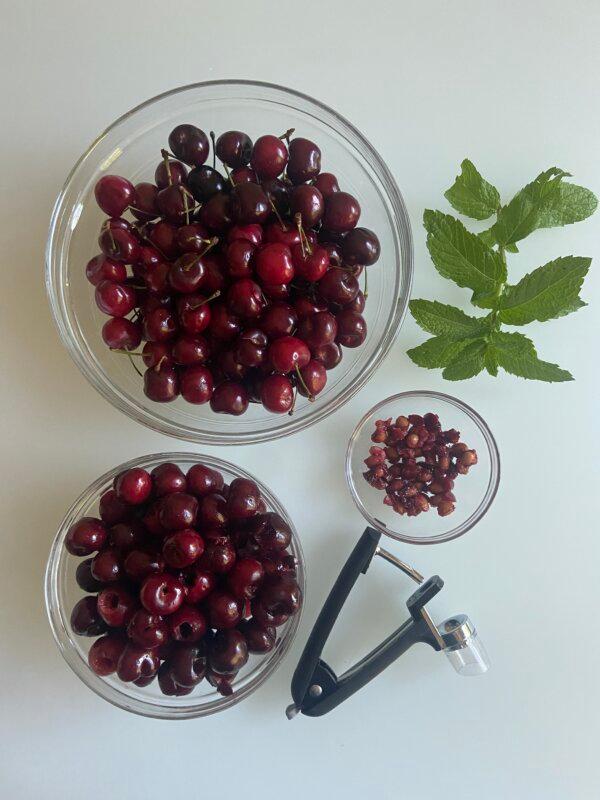 Pitting cherries is messy work, so you may want to avoid wearing white. (JeanMarie Brownson/TNS)