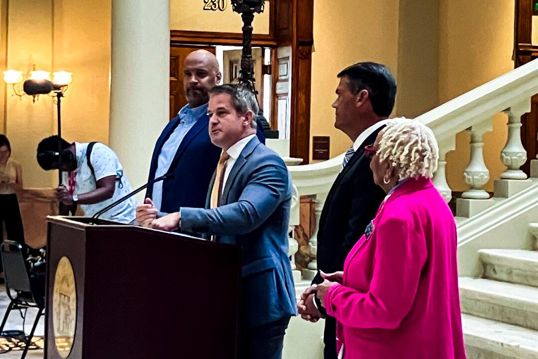 Former GOP Rep. Adam Kinzinger Endorses Biden