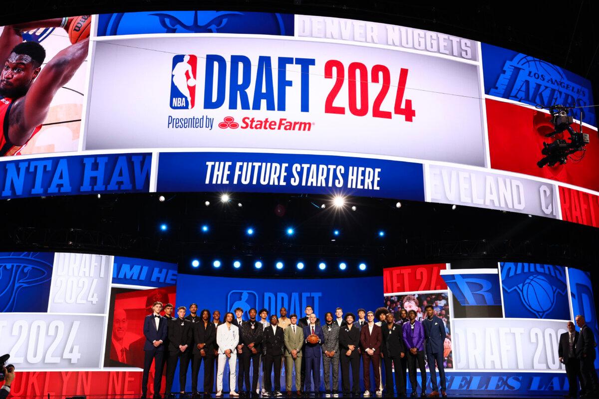 The top prospects pose for a photo with NBA commissioner Adam Silver prior to the first round of the 2024 NBA Draft at Barclays Center in the Brooklyn borough of New York City on June 26, 2024. (Sarah Stier/Getty Images)