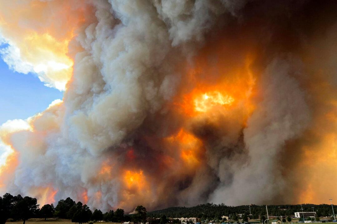 Wildfires Rage Across Several States as Extreme Heat Persists