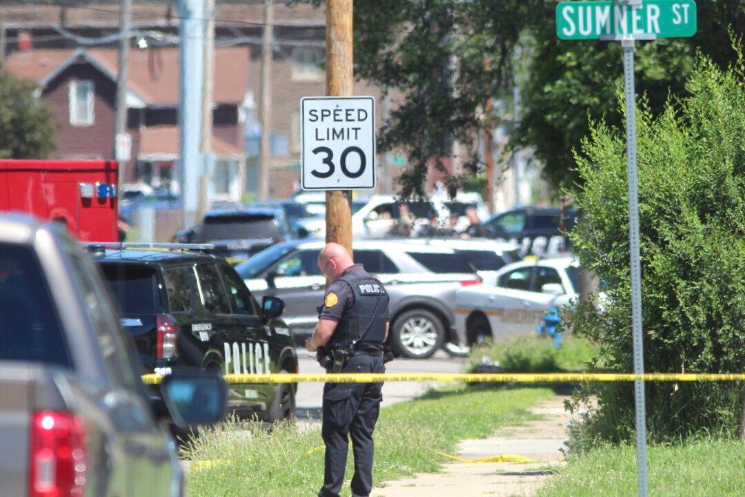 Armed Bicyclist Killed in Iowa Shooting That Wounded 2 Police Officers, Investigators Say