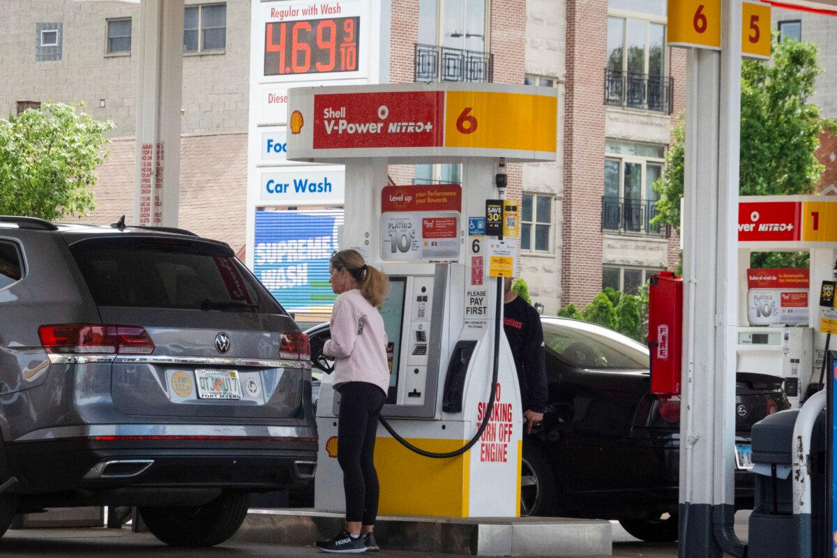 A sign displays gas prices at a gas station in Chicago on May 21, 2024. (Scott Olson/Getty Images)