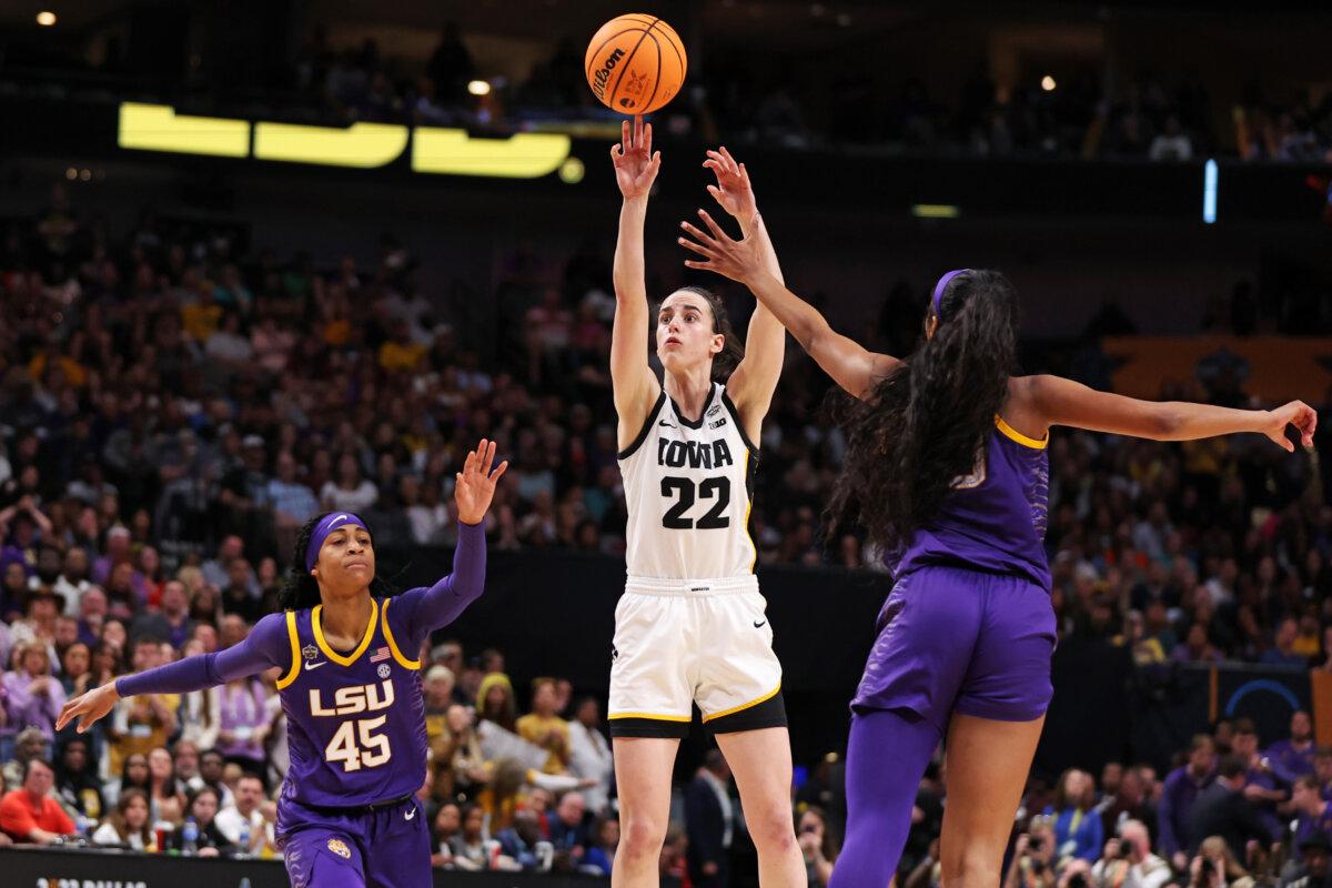 Caitlin Clark #22 of the Iowa Hawkeyes shoots the ball against Angel Reese #10 of the LSU Lady Tigers during the fourth quarter during the 2023 NCAA Women's Basketball Tournament championship game at American Airlines Center in Dallas, Texas on April 02, 2023. (Maddie Meyer/Getty Images)