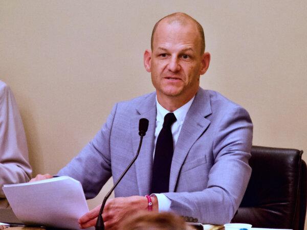 Assemblyman Kevin McCarty, chair of the Assembly's Public Safety Committee, makes a motion to amend Senate Bill 1414 during the committee hearing at the Capitol in Sacramento, Calif., on July 2, 2024. (Travis Gillmore/The Epoch Times)