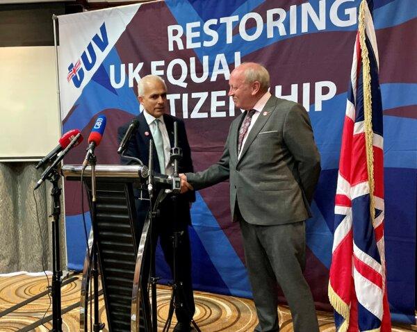 Reform UK deputy leader Ben Habib (L) and TUV leader Jim Allister (R) shake hands at the TUV manifesto launch at Dunsilly Hotel in Antrim, Northern Ireland on June 21, 2024. (David Young/PA Wire)